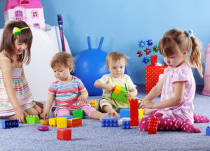 bigstock Group of kids playing with con 12140777 2 1