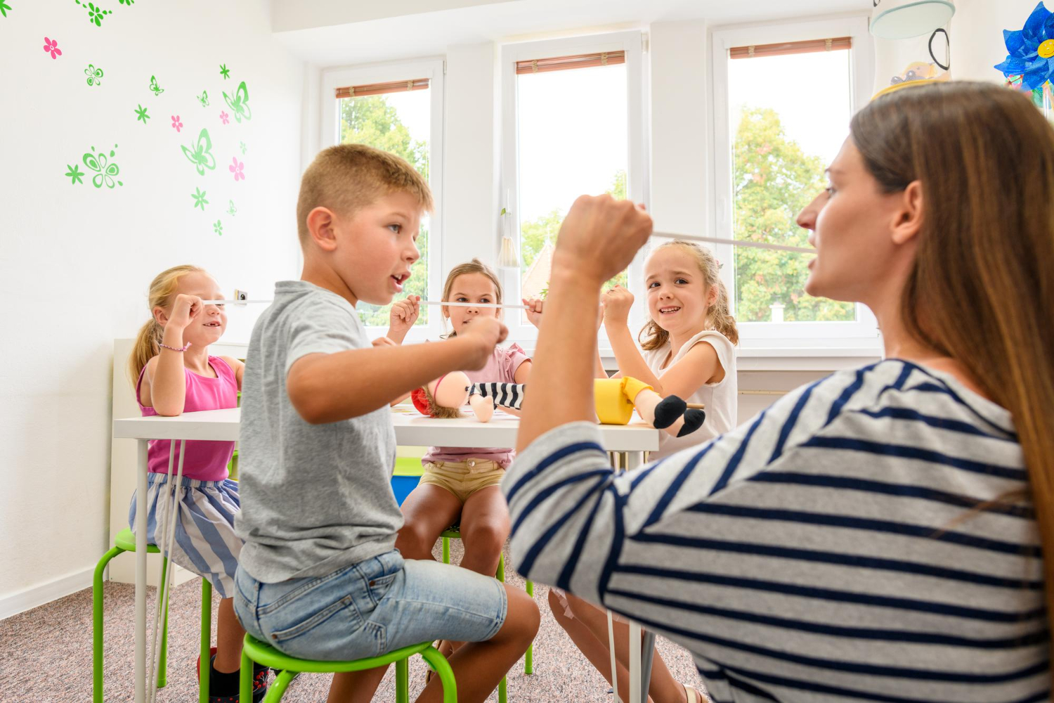 Children engaging in both speech and occupational therapy at Theracare to improve communication and motor skills.